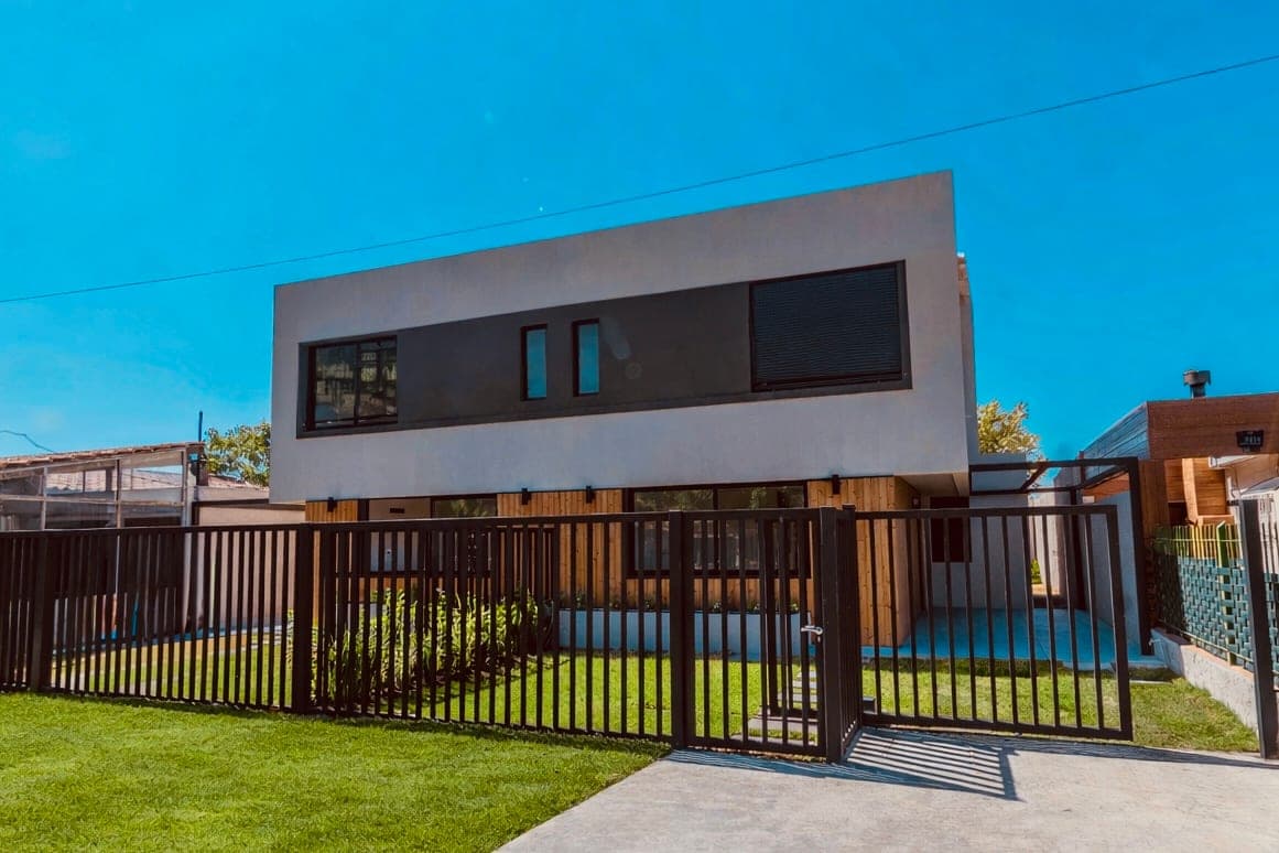 Street view of the duplex homes at Barra de Carrasco II